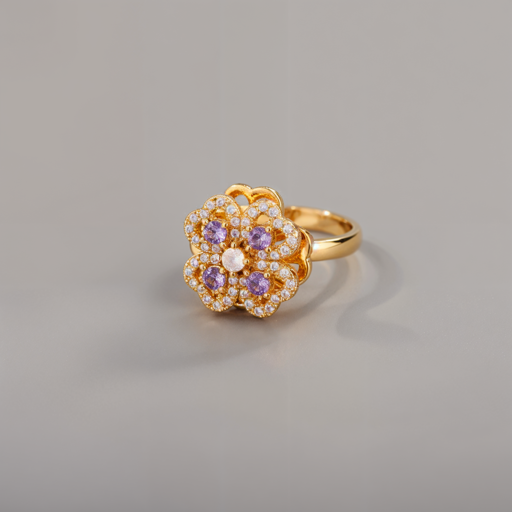 Anillo antiestrés giratorio dorado y violeta para mujer