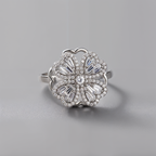 Anillo flor giratorio plateado para reducir ansiedad en el cualquier lugar