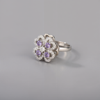 Anillo antiestrés giratorio plateado y violeta para mujer